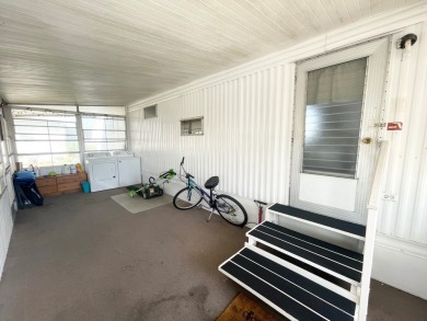 This home is located in a 55+ community!! This CUTE and UPDATED on Lone Palm Golf Club in Florida - for sale on GolfHomes.com, golf home, golf lot