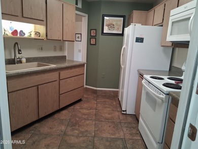 Rare 3-bedroom townhouse with an oversized private backyard! on Sun City Lakes West and East in Arizona - for sale on GolfHomes.com, golf home, golf lot