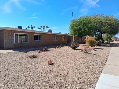 Rare 3-bedroom townhouse with an oversized private backyard! on Sun City Lakes West and East in Arizona - for sale on GolfHomes.com, golf home, golf lot