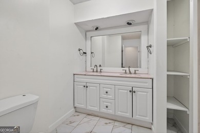 Located in the sought-after Fairfield Plantation, this 4-bedroom on Fairfield Plantation Golf and Country Club in Georgia - for sale on GolfHomes.com, golf home, golf lot