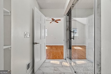 Located in the sought-after Fairfield Plantation, this 4-bedroom on Fairfield Plantation Golf and Country Club in Georgia - for sale on GolfHomes.com, golf home, golf lot