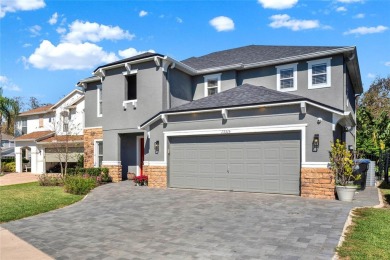 Welcome to this stunning pool home nestled in the exclusive on Eagle Creek Golf Club in Florida - for sale on GolfHomes.com, golf home, golf lot