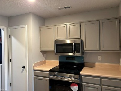 Welcome to this beautifully updated townhouse-style condo, where on Honey Bee Golf Club in Virginia - for sale on GolfHomes.com, golf home, golf lot