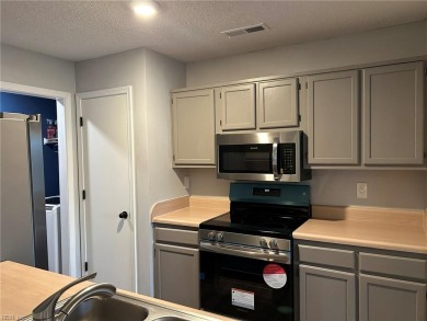 Welcome to this beautifully updated townhouse-style condo, where on Honey Bee Golf Club in Virginia - for sale on GolfHomes.com, golf home, golf lot