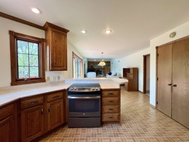 MOTIVATED SELLERS! Bordering South Hills Golf Course, this on South Hills Golf and Country Club in Wisconsin - for sale on GolfHomes.com, golf home, golf lot