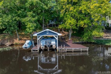 Lake Gaston and your future getaway awaits!  Fully furnished & on Tanglewood Shores Golf and Country Club in Virginia - for sale on GolfHomes.com, golf home, golf lot