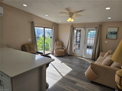 Direct Gulf Access in an active 55+ community! Totally renovated on Pelicans Nest Golf Club in Florida - for sale on GolfHomes.com, golf home, golf lot