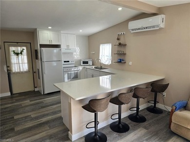 Direct Gulf Access in an active 55+ community! Totally renovated on Pelicans Nest Golf Club in Florida - for sale on GolfHomes.com, golf home, golf lot