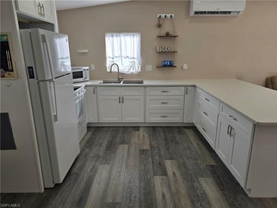 Direct Gulf Access in an active 55+ community! Totally renovated on Pelicans Nest Golf Club in Florida - for sale on GolfHomes.com, golf home, golf lot