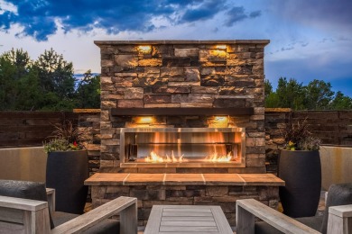 Tucked along the 18th fairway in Paa-Ko, this stunning custom on Paa-Ko Ridge Golf Club  in New Mexico - for sale on GolfHomes.com, golf home, golf lot