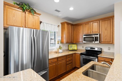 Discover the perfect blend of comfort and convenience in this on Sea Trail Golf Resort in North Carolina - for sale on GolfHomes.com, golf home, golf lot