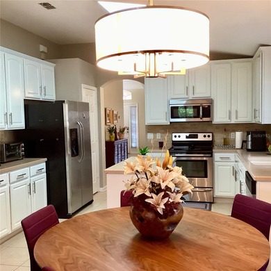 Located at Stonebridge Lakes in MetroWest this brightness on MetroWest Golf Club in Florida - for sale on GolfHomes.com, golf home, golf lot