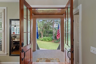 Privately nestled on a serene cul-de-sac within the gated on The Links at Stono Ferry in South Carolina - for sale on GolfHomes.com, golf home, golf lot