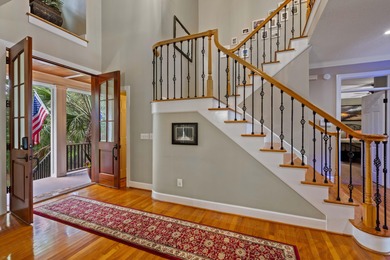 Privately nestled on a serene cul-de-sac within the gated on The Links at Stono Ferry in South Carolina - for sale on GolfHomes.com, golf home, golf lot