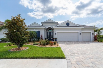Elegant, beautifully landscaped Lee Wetherington 2-Bedroom on River Wilderness Golf and Country Club in Florida - for sale on GolfHomes.com, golf home, golf lot