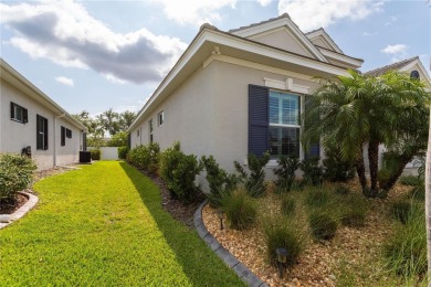 Elegant, beautifully landscaped Lee Wetherington 2-Bedroom on River Wilderness Golf and Country Club in Florida - for sale on GolfHomes.com, golf home, golf lot