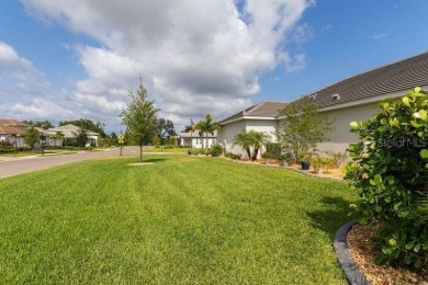 Elegant, beautifully landscaped Lee Wetherington 2-Bedroom on River Wilderness Golf and Country Club in Florida - for sale on GolfHomes.com, golf home, golf lot