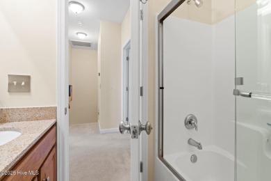 Discover the perfect blend of comfort and convenience in this on Sea Trail Golf Resort in North Carolina - for sale on GolfHomes.com, golf home, golf lot
