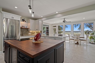 Privately nestled on a serene cul-de-sac within the gated on The Links at Stono Ferry in South Carolina - for sale on GolfHomes.com, golf home, golf lot
