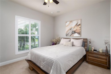 Elegant, beautifully landscaped Lee Wetherington 2-Bedroom on River Wilderness Golf and Country Club in Florida - for sale on GolfHomes.com, golf home, golf lot