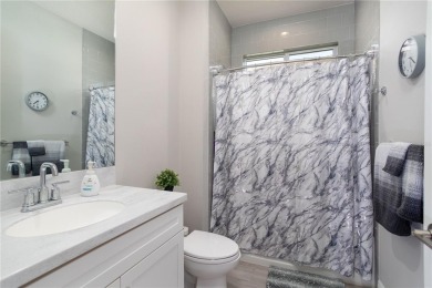Elegant, beautifully landscaped Lee Wetherington 2-Bedroom on River Wilderness Golf and Country Club in Florida - for sale on GolfHomes.com, golf home, golf lot