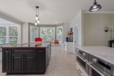 Privately nestled on a serene cul-de-sac within the gated on The Links at Stono Ferry in South Carolina - for sale on GolfHomes.com, golf home, golf lot