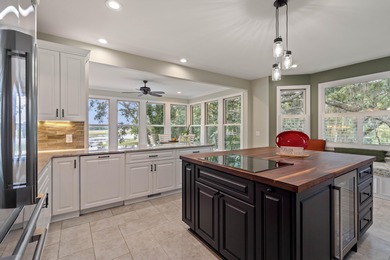 Privately nestled on a serene cul-de-sac within the gated on The Links at Stono Ferry in South Carolina - for sale on GolfHomes.com, golf home, golf lot