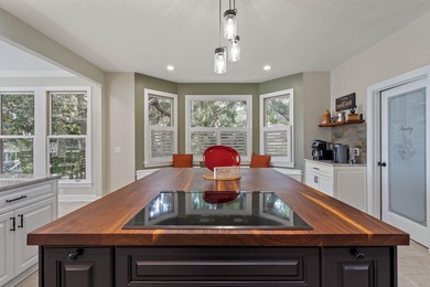 Privately nestled on a serene cul-de-sac within the gated on The Links at Stono Ferry in South Carolina - for sale on GolfHomes.com, golf home, golf lot