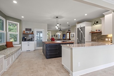 Privately nestled on a serene cul-de-sac within the gated on The Links at Stono Ferry in South Carolina - for sale on GolfHomes.com, golf home, golf lot