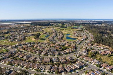 Nestled within Trilogy at Monarch Dunes, this single-story on Monarch Dunes Golf Club - Old Course in California - for sale on GolfHomes.com, golf home, golf lot