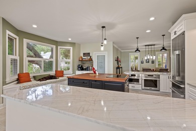 Privately nestled on a serene cul-de-sac within the gated on The Links at Stono Ferry in South Carolina - for sale on GolfHomes.com, golf home, golf lot