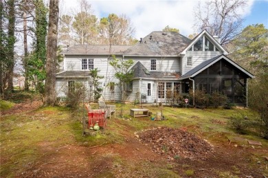 Stunning beauty surrounds this graceful home in Brookstone on Brookstone Golf and Country Club in Georgia - for sale on GolfHomes.com, golf home, golf lot