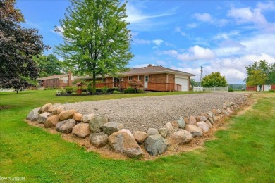 Stunning 3-Bedroom Brick Ranch with Modern Upgrades  Scenic on Richmond Forest in Michigan - for sale on GolfHomes.com, golf home, golf lot