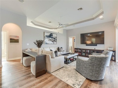 This attractive home sits on a beautifully landscaped lot in the on Shadow Wood Country Club in Florida - for sale on GolfHomes.com, golf home, golf lot