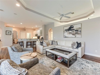 This attractive home sits on a beautifully landscaped lot in the on Shadow Wood Country Club in Florida - for sale on GolfHomes.com, golf home, golf lot