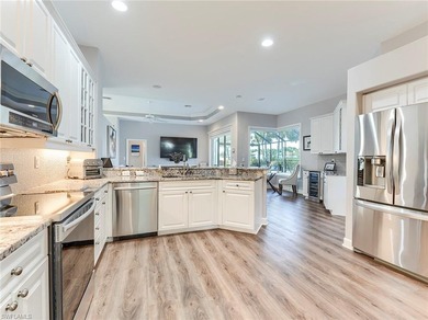 This attractive home sits on a beautifully landscaped lot in the on Shadow Wood Country Club in Florida - for sale on GolfHomes.com, golf home, golf lot