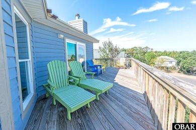 Fall in! Sitting well elevated in an X flood zone, Sunny Days is on The Currituck Golf Club in North Carolina - for sale on GolfHomes.com, golf home, golf lot