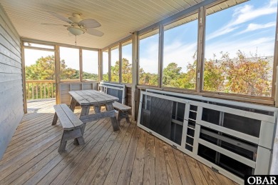 Fall in! Sitting well elevated in an X flood zone, Sunny Days is on The Currituck Golf Club in North Carolina - for sale on GolfHomes.com, golf home, golf lot