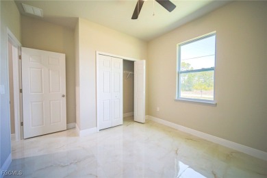 You Will Be Amazed By The Quality Of This Brand New Construction on Lehigh Resort Club in Florida - for sale on GolfHomes.com, golf home, golf lot