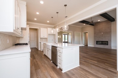 Beautiful all-brick new construction home on a level lot in the on The Country Club of Arkansas in Arkansas - for sale on GolfHomes.com, golf home, golf lot