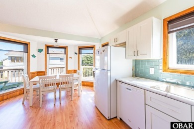 Fall in! Sitting well elevated in an X flood zone, Sunny Days is on The Currituck Golf Club in North Carolina - for sale on GolfHomes.com, golf home, golf lot