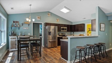 Welcome to your dream home in the coveted Lake Royale community on River Golf and County Club at Lake Royale in North Carolina - for sale on GolfHomes.com, golf home, golf lot