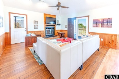 Fall in! Sitting well elevated in an X flood zone, Sunny Days is on The Currituck Golf Club in North Carolina - for sale on GolfHomes.com, golf home, golf lot