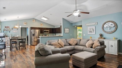 Welcome to your dream home in the coveted Lake Royale community on River Golf and County Club at Lake Royale in North Carolina - for sale on GolfHomes.com, golf home, golf lot