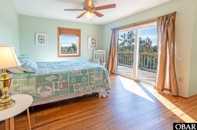 Fall in! Sitting well elevated in an X flood zone, Sunny Days is on The Currituck Golf Club in North Carolina - for sale on GolfHomes.com, golf home, golf lot