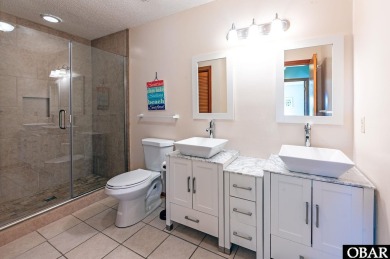 Fall in! Sitting well elevated in an X flood zone, Sunny Days is on The Currituck Golf Club in North Carolina - for sale on GolfHomes.com, golf home, golf lot