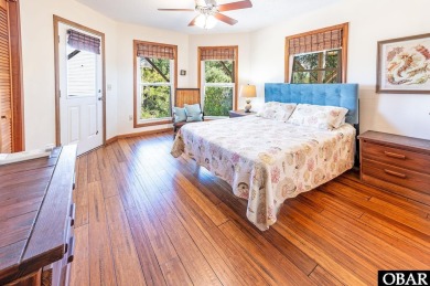 Fall in! Sitting well elevated in an X flood zone, Sunny Days is on The Currituck Golf Club in North Carolina - for sale on GolfHomes.com, golf home, golf lot