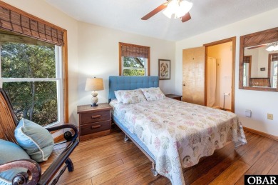 Fall in! Sitting well elevated in an X flood zone, Sunny Days is on The Currituck Golf Club in North Carolina - for sale on GolfHomes.com, golf home, golf lot