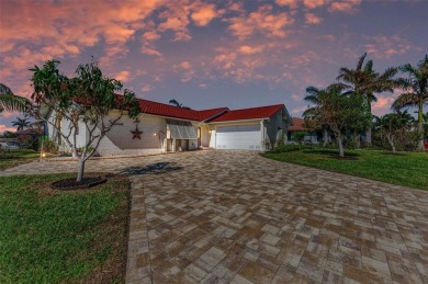 Beautifully updated 3 bedroom, 2 bathroom pool home with dock on on Saint Andrews South Golf Club in Florida - for sale on GolfHomes.com, golf home, golf lot