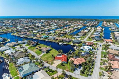 Beautifully updated 3 bedroom, 2 bathroom pool home with dock on on Saint Andrews South Golf Club in Florida - for sale on GolfHomes.com, golf home, golf lot